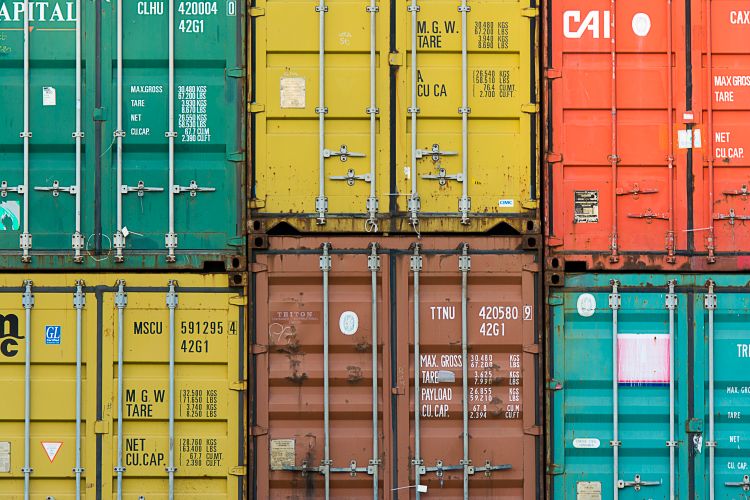Shipping containers at a busy port
