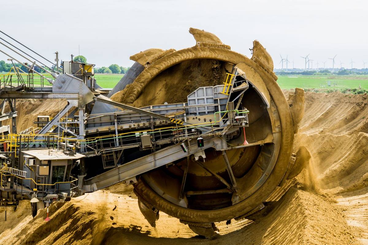 Bucket-wheel excavator and conveyor at a surface mine